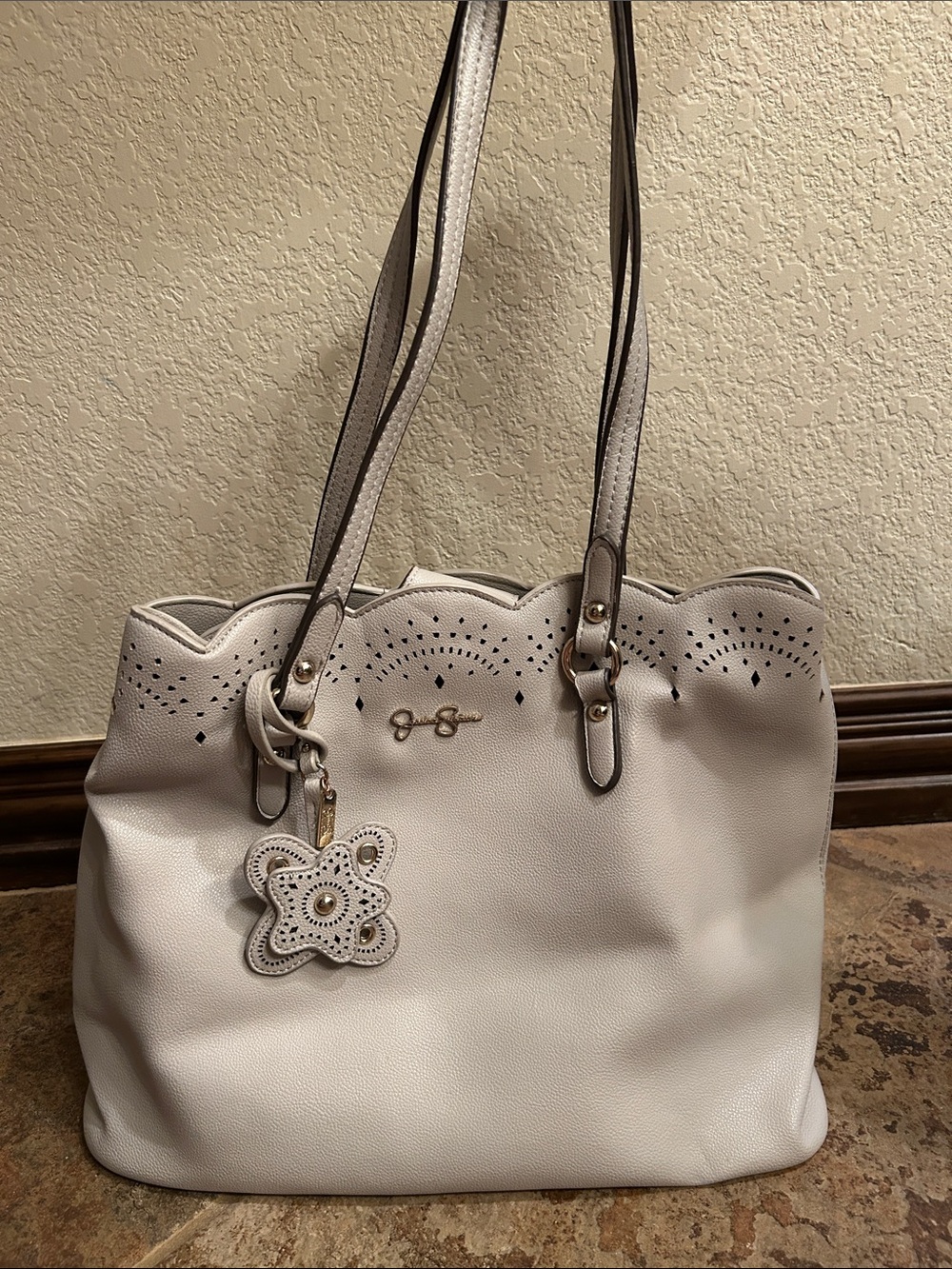 Jessica Simpson Cream Scalloped Perforated Tote with Floral Charm
